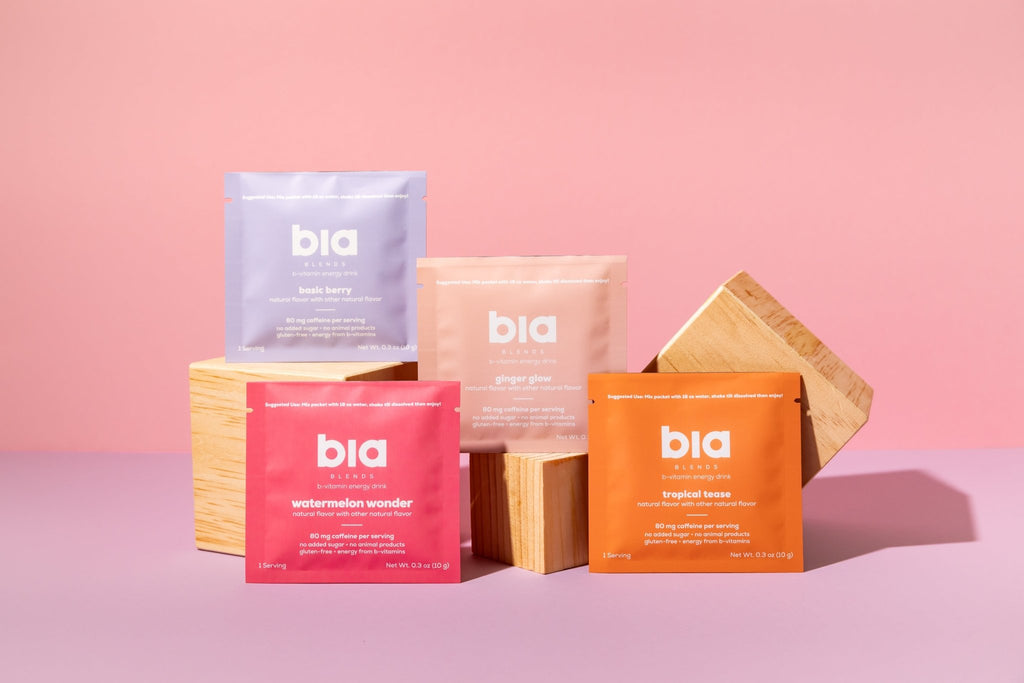 bia energy drink single serve products on a pink background