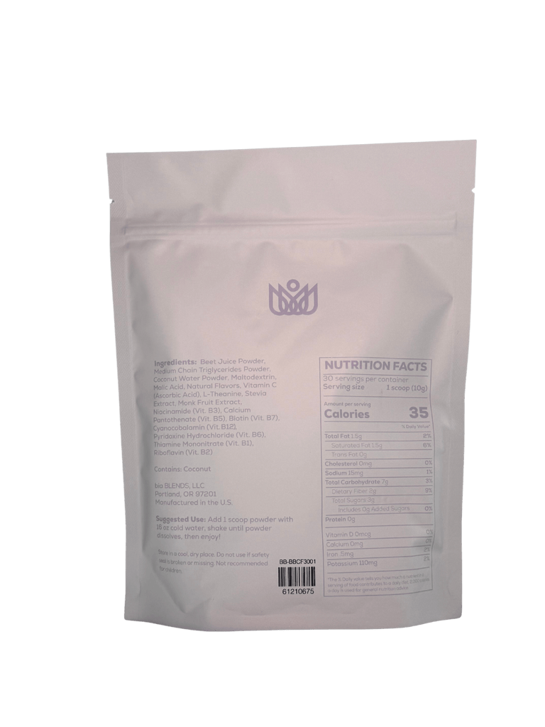 White caffeine-free energy drink powder package with nutrition facts on a green background